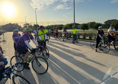 Cycling group at Northwest Cycling Club event, enjoying a morning ride in scenic suburban area.
