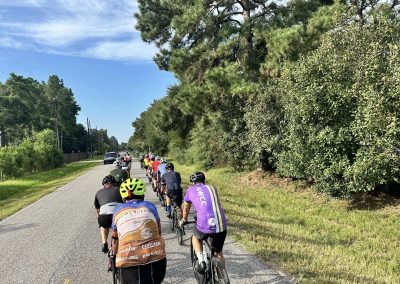 NWCC Vintage Park Starbucks Ride 51 Cycling group riding on scenic rural road with lush greenery and blue sky, part of Northwest Cycling Club outdoor sports and cycling events.