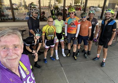NWCC Vintage Park Starbucks Ride 44 Group of cyclists wearing colorful gear, ready for a ride with Northwest Cycling Club.
