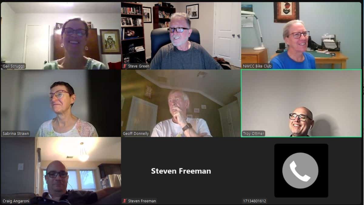 Active group photo of Northwest Cycling Club members during virtual meeting, showcasing community and cycling enthusiasts.