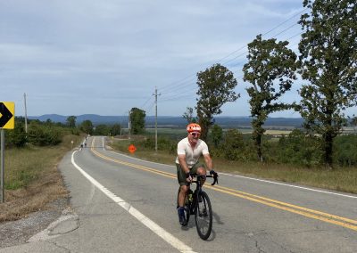 Enjoying scenic cycling ride on rural roads with Northwest Cycling Club in Oregon countryside.