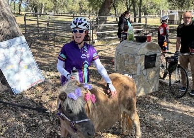 Cycling In Houston - NWCC Recent Activities Gallery 667 Cute girl riding pony at Northwest Cycling Club outdoor event, friendly cycling community, family-friendly rides and activities.