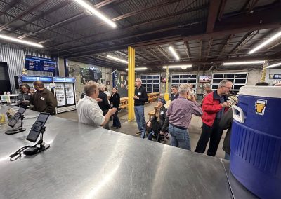 Cycling In Houston - NWCC Recent Activities Gallery 636 Community gathering at Northwest Cycling Club event in an indoor bike venue.