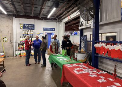 Cycling In Houston - NWCC Recent Activities Gallery 625 Indoor cycling club event at Northwest Cycling Club with members and holiday-themed tables.