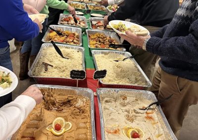 Cycling In Houston - NWCC Recent Activities Gallery 597 Delicious buffet at Northwest Cycling Club event, featuring diverse food options for members.