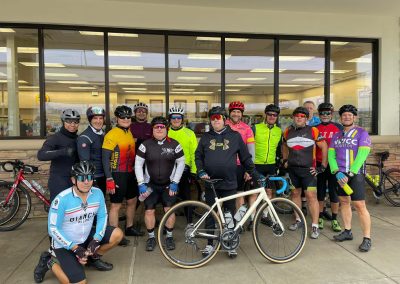 Cycling In Houston - NWCC Recent Activities Gallery 586 Group of cycling enthusiasts from Northwest Cycling Club ready for a ride in front of a coffee shop.