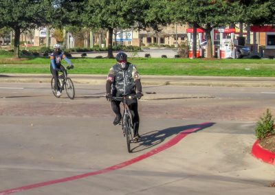 Cycling In Houston - NWCC Recent Activities Gallery 574 Cyclists riding in Northwest Cycling Club outdoor event, city street scene, biking community, safe cycling.