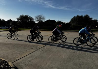 Cycling In Houston - NWCC Recent Activities Gallery 582 Group of cyclists riding together on a bike ride organized by Northwest Cycling Club during daytime.