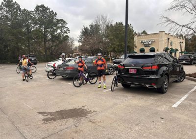 Cycling In Houston - NWCC Recent Activities Gallery 568 Bicyclists from Northwest Cycling Club gathering in parking lot near Starbucks coffee.