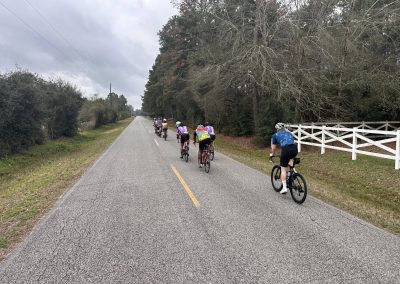 Cycling In Houston - NWCC Recent Activities Gallery 563 Cycling group on rural road, Northwest Cycling Club members enjoying outdoor bike ride.