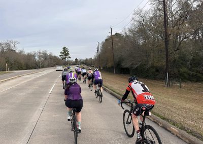 Cycling In Houston - NWCC Recent Activities Gallery 543 Cycling group riding on the road, Northwest Cycling Club, outdoor bike ride, cycling enthusiasts, group cycling event.