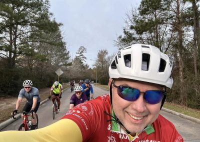 Cycling In Houston - NWCC Recent Activities Gallery 549 Vibrant group cycling in scenic Oregon forest on Northwest Cycling Club ride Adult cyclists enjoying outdoor recreation and social rides in NW Oregon.