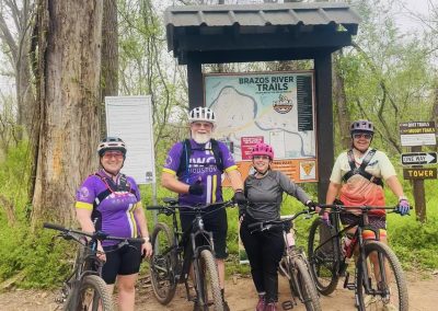 Cycling In Houston - NWCC Recent Activities Gallery 537 Family biking at Brazos River Trails in Northwest Texas, perfect for cycling enthusiasts and outdoor adventure seekers.
