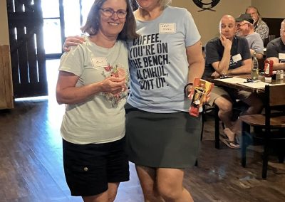 Cycling In Houston - NWCC Recent Activities Gallery 531 Friendly women smiling, celebrating at Northwest Cycling Club event, enjoying camaraderie and community.