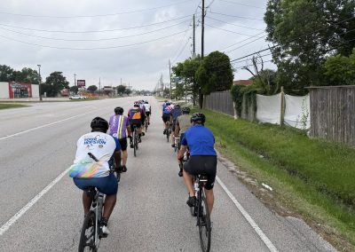 Cycling In Houston - NWCC Recent Activities Gallery 509 Cycling group riding on a road during a Northwest Cycling Club event in Houston.