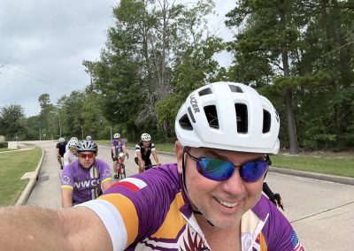 Cycling In Houston - NWCC Recent Activities Gallery 505 Cyclists riding together during a Northwest Cycling Club group ride outdoors.