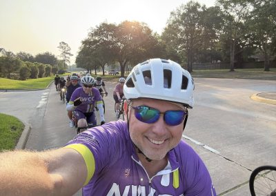 Cycling In Houston - NWCC Recent Activities Gallery 486 Happy Northwest Cycling Club member taking a selfie during group bike ride in Houston, TX.