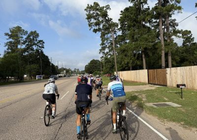 Cycling In Houston - NWCC Recent Activities Gallery 472 Cycling group riding on local road with Northwest Cycling Club, promoting healthy outdoor activities.