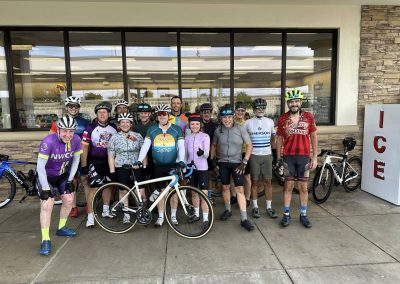Cycling In Houston - NWCC Recent Activities Gallery 475 Cycling group of Northwest Cycling Club members with bikes, smiling outside a coffee shop.