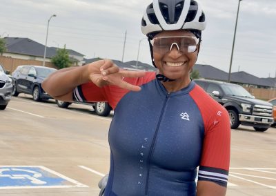 Cycling In Houston - NWCC Recent Activities Gallery 442 Vibrant female cyclist enjoying group ride with Northwest Cycling Club, showcasing cycling, outdoor, and fitness passion.