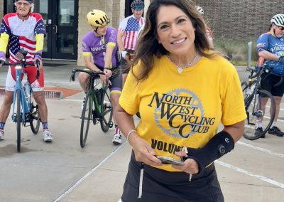 Cycling In Houston - NWCC Recent Activities Gallery 443 Cycling enthusiast in NWCC volunteer T-shirt at Northwest Cycling Club event.