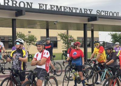 Cycling In Houston - NWCC Recent Activities Gallery 436 Cycling enthusiasts gathering at Northwest Cycling Club event outside Parron Elementary School.