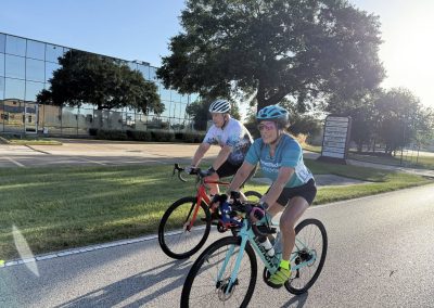 Cycling In Houston - NWCC Recent Activities Gallery 395 Cyclists riding together during morning ride with Northwest Cycling Club in a sunny outdoor setting.