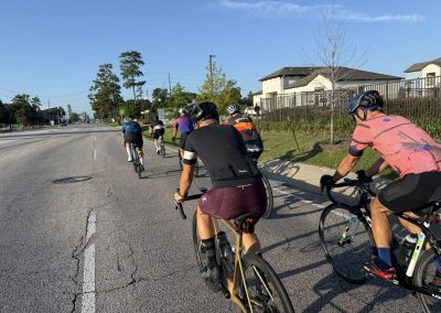 Cycling In Houston - NWCC Recent Activities Gallery 419 Group cycling ride on a scenic road with Northwest Cycling Club, promoting outdoor fitness and community biking.