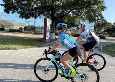 Cycling In Houston - NWCC Recent Activities Gallery 399 Cyclists riding together on a scenic outdoor trail for Northwest Cycling Club.
