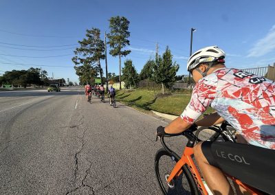 Cycling In Houston - NWCC Recent Activities Gallery 416 Vibrant group cycling ride in Northwest Portland, showcasing community and outdoor cycling fitness.