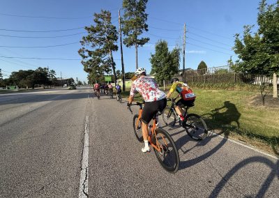 Cycling In Houston - NWCC Recent Activities Gallery 415 Cycling group riding on road, promoting Northwest Cycling Club, bike community, and outdoor fitness.