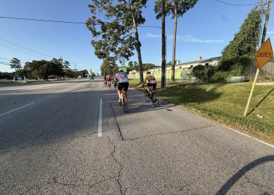 Cycling In Houston - NWCC Recent Activities Gallery 413 Group cycling event on urban street with Northwest Cycling Club members.