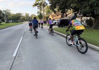 Cycling In Houston - NWCC Recent Activities Gallery 378 Cyclists riding on a suburban street during a Northwest Cycling Club group ride.