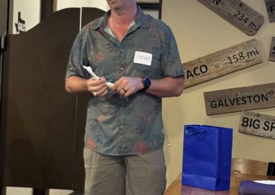 Cycling In Houston - NWCC Recent Activities Gallery 362 Man speaking at Northwest Cycling Club event, giving a presentation on local cycling routes.