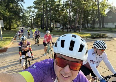 Cycling In Houston - NWCC Recent Activities Gallery 348 Group of cyclists enjoying a ride together on a scenic outdoor path, promoting fitness and community through Northwest Cycling Club.