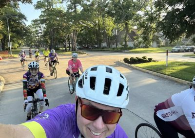 Cycling In Houston - NWCC Recent Activities Gallery 349 Vibrant group cycling event at Northwest Cycling Club, outdoor bike ride on sunny day.