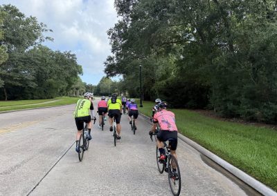 Cycling In Houston - NWCC Recent Activities Gallery 333 Group riding cyclists on scenic pathway - Northwest Cycling Club bike ride.