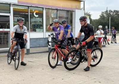 Cycling In Houston - NWCC Recent Activities Gallery 271 Cycling group of cyclists at rest outside North West Cycling Club, ready for a ride.