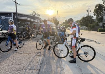 Cycling In Houston - NWCC Recent Activities Gallery 302 Cycling group gathering at Northwest Cycling Club for a scenic ride at sunset.