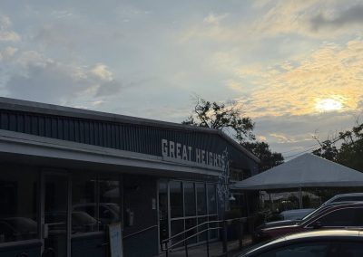 Cycling In Houston - NWCC Recent Activities Gallery 305 Graham Heights building with outdoor sunset view, promoting Northwest Cycling Club events and community rides.