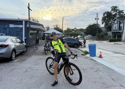 Cycling In Houston - NWCC Recent Activities Gallery 310 Cyclist with NWCC cycling jersey at the parking lot before a ride.