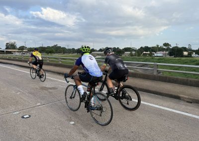 Cycling In Houston - NWCC Recent Activities Gallery 286 Bicycle group riding on a road, members of Northwest Cycling Club enjoying group cycling.