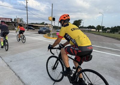 Cycling In Houston - NWCC Recent Activities Gallery 283 Cycling club member riding a road bike during group ride, Northwest Cycling Club event, outdoor cycling, summer sport.