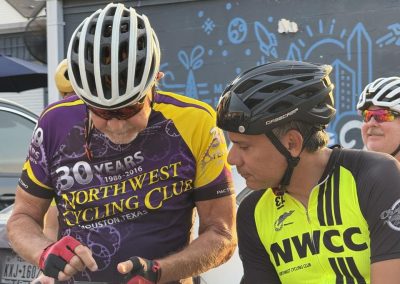 Cycling In Houston - NWCC Recent Activities Gallery 299 30th Anniversary Northwest Cycling Club in Houston Texas during a cycling event, featuring passionate cyclists in team jerseys.