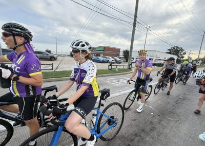 Cycling In Houston - NWCC Recent Activities Gallery 260 Group riding with Northwest Cycling Club, cyclists in colorful jerseys on a community bike ride.