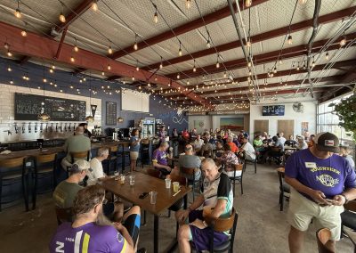 Cycling In Houston - NWCC Recent Activities Gallery 247 Relaxed cyclists gathering at a cozy brewery after a Northwest Cycling Club ride.