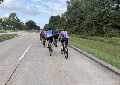 Cycling In Houston - NWCC Recent Activities Gallery 265 Group cycling on scenic paved road, Northwest Cycling Club bike ride event.