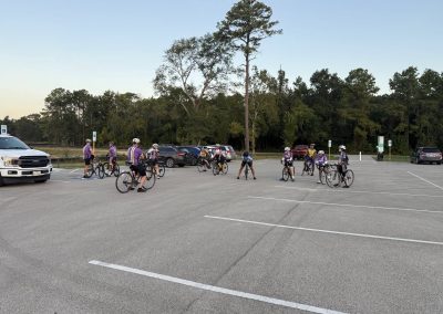 Cycling In Houston - NWCC Recent Activities Gallery 230 Cycling group at a parking lot during Northwest Cycling Club ride in nature.
