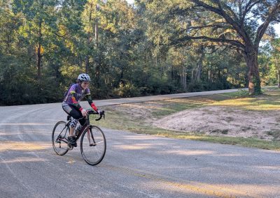 Cycling In Houston - NWCC Recent Activities Gallery 204 Bike rider cycling on scenic trail - Northwest Cycling Club outdoor adventure.