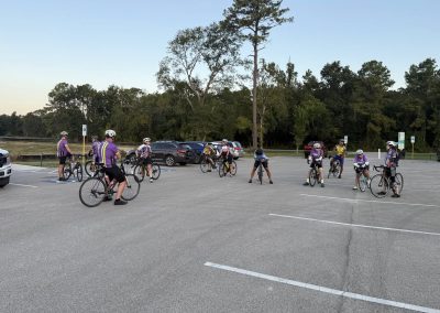 Cycling In Houston - NWCC Recent Activities Gallery 228 Cycling group at Northwest Cycling Club preparing for ride in a parking lot, outdoor sports, biking, community cycling event.